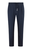 Dark navy technical stretch drawstring pants with elastic waistband, front view.