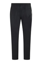 Black technical stretch pants with back pocket details and tapered leg