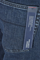 Dark blue denim jeans with Tramarossa fabric label inside front pocket.