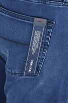 Tramarossa jeans fabric label on blue denim pocket
