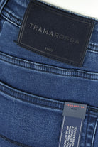Tramarossa leather patch and care label on blue denim waistband