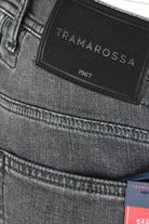 Tramarossa 1967 leather patch on dark grey denim waistband with stitching