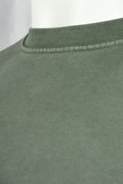 Olive green crewneck collar with ribbed neckline and brushed fleece texture