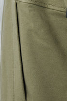 Olive green sweatshirt fabric with side seam and pocket opening detail