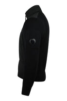 Black padded jacket with rib-knit sleeve and buttoned flap pocket on the side