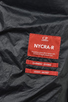 Black padded jacket with NYCRA-R garment label