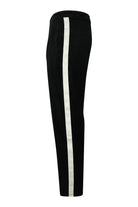 Black velour track pants with white side tape stripe
