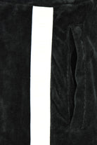 Black velour track pants with white side tape stripe and side pocket
