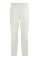 White velour track pants with elastic waistband and straight leg