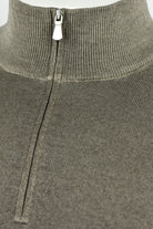 Close-up of the jumper's ribbed collar and metal zipper pull