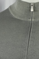 Close-up of the cardigan's ribbed collar and metal zipper pull