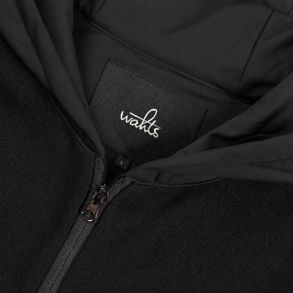 Wahts logo label inside hood; full-zip hoodie with metal zipper pull