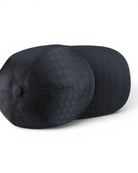 Canali tech weave cap close-up, dark navy woven texture and stitched panels.