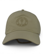 Beige nylon cap with front circular logo stamp and curved brim