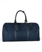 Blue nylon holdall with leather trim, two top handles and central strap