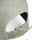 Stone grey linen baseball cap interior with elastic drawcord adjustment