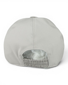 Grey cap interior with ruched chin strap and protective inner lining.