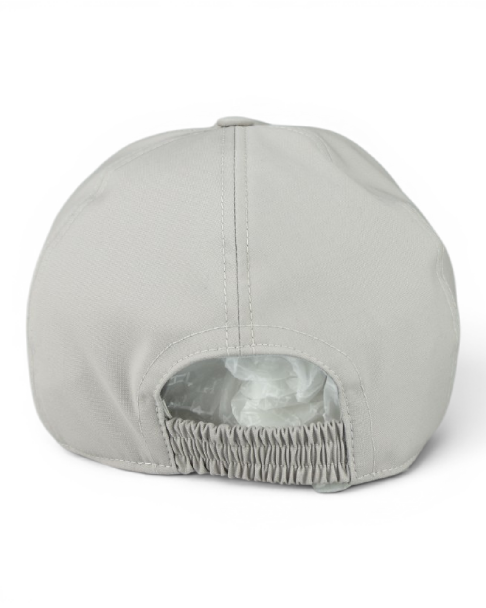 Grey cap interior with ruched chin strap and protective inner lining.