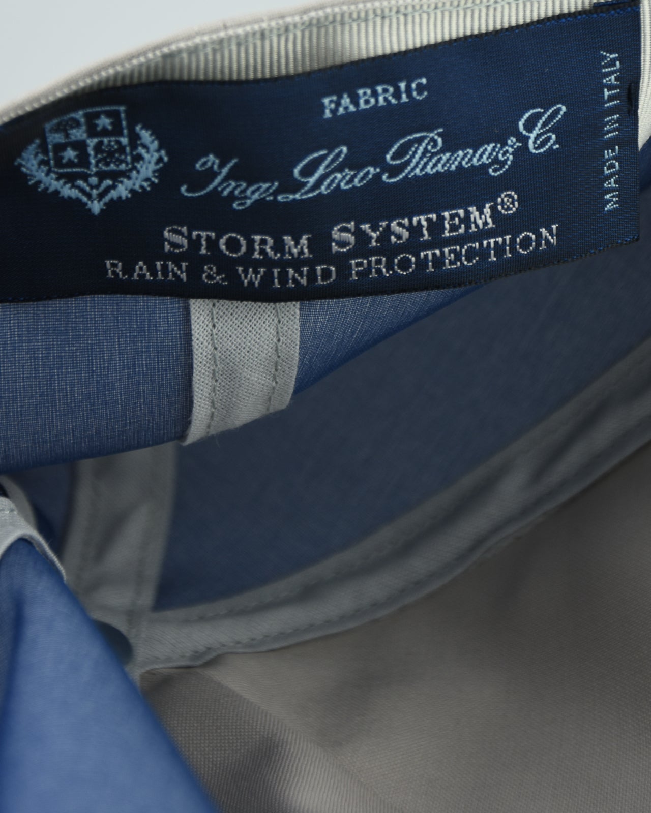 Storm System fabric label: Rain & Wind protection on cap interior lining.