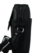 Black leather crossbody bag with zip top, crossbody strap, and metal hardware
