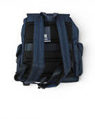 Blue nylon backpack back panel with padded mesh sections and adjustable shoulder straps.