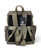 Beige nylon backpack with padded back panel, adjustable harness straps, and QR tag.