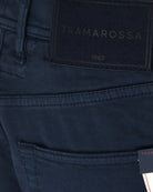 Tramarossa 1967 fabric label on navy shorts waistband above front pocket seams