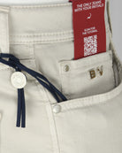 Light grey shorts waistband with blue drawstring and red QR product tag