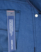 Blue woven pants fabric with side pocket and 'TRAMAROSSA' care label