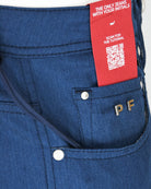 Blue woven pants with red hang tag, button waist, and PF initials patch