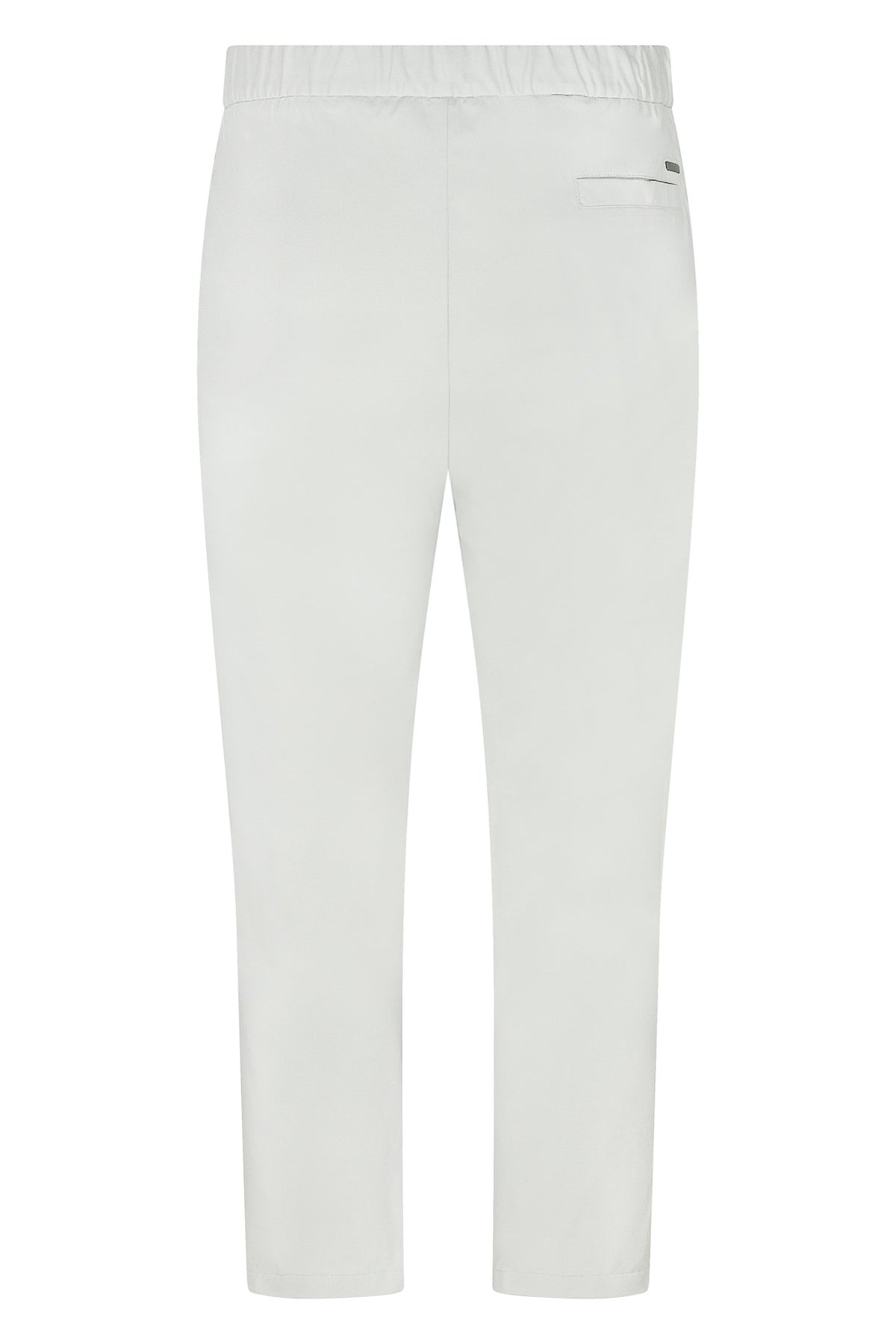 Off-white nylon jersey pants with elastic waist, front creases, side pockets