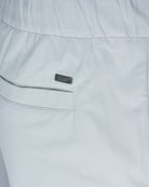 Off-grey nylon jersey pant front pocket detail with Herno logo label