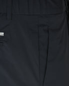 Herno black nylon pants close-up of pocket seam and stitched panel