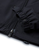 Navy jacket sleeve with zip front and snap-button storm flap