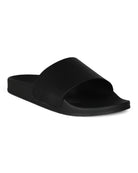 Black leather wave-print slider with wide textured strap and cushioned footbed