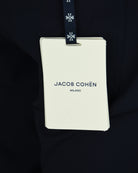 Navy technical pants fabric tag with JACOB COHEN MILANO logo