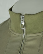 Smoke green blouson jacket zipper with rib-knit collar trim
