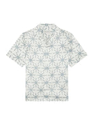 White t-shirt with blue geometric pattern on a white background