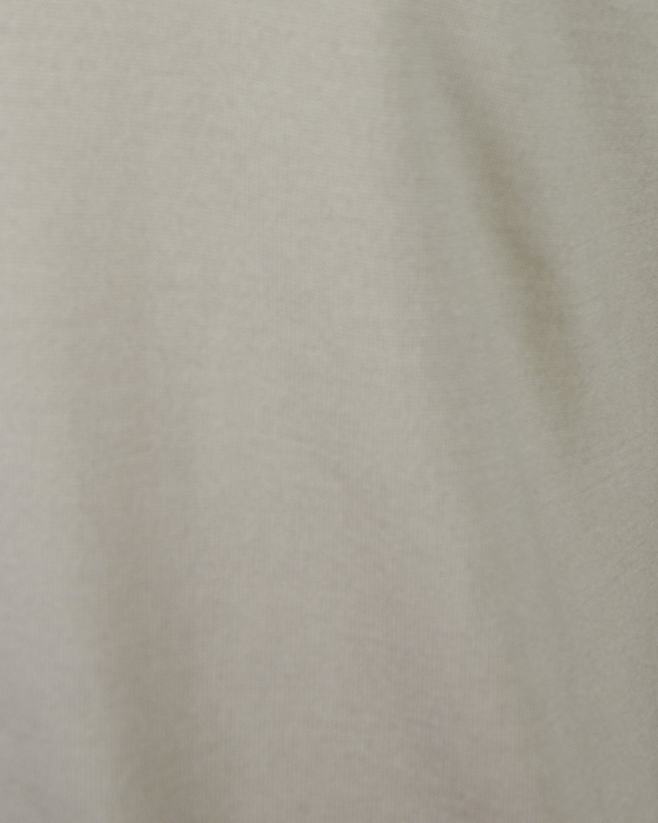 Stone beige silk-mix polo fabric close-up with fine textured weave