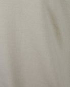 Stone beige silk-mix polo fabric close-up with fine textured weave