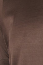 Mercerised knit fabric closeup on dark brown t-shirt