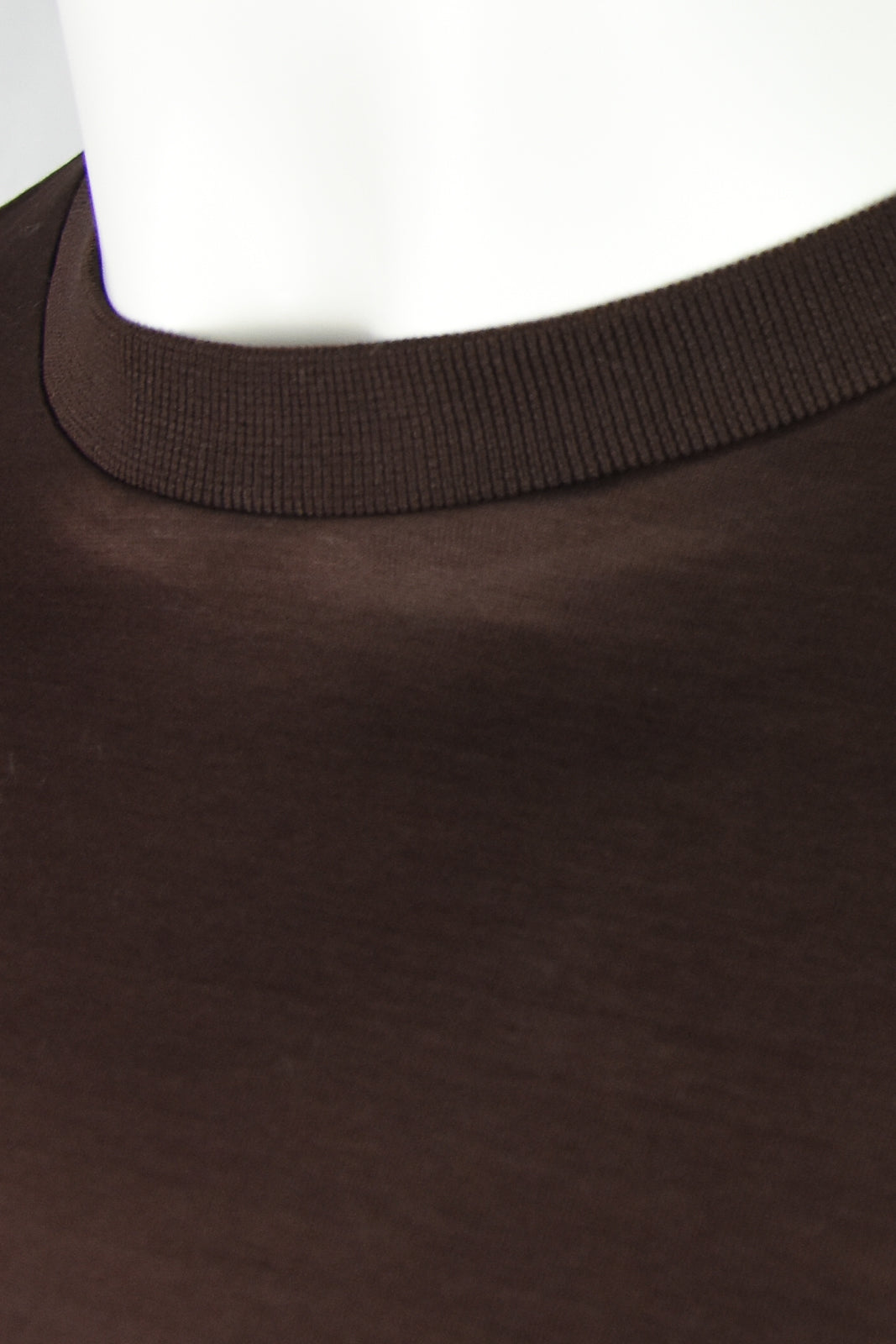 Ribbed high-neck collar detail on dark brown short-sleeve t-shirt