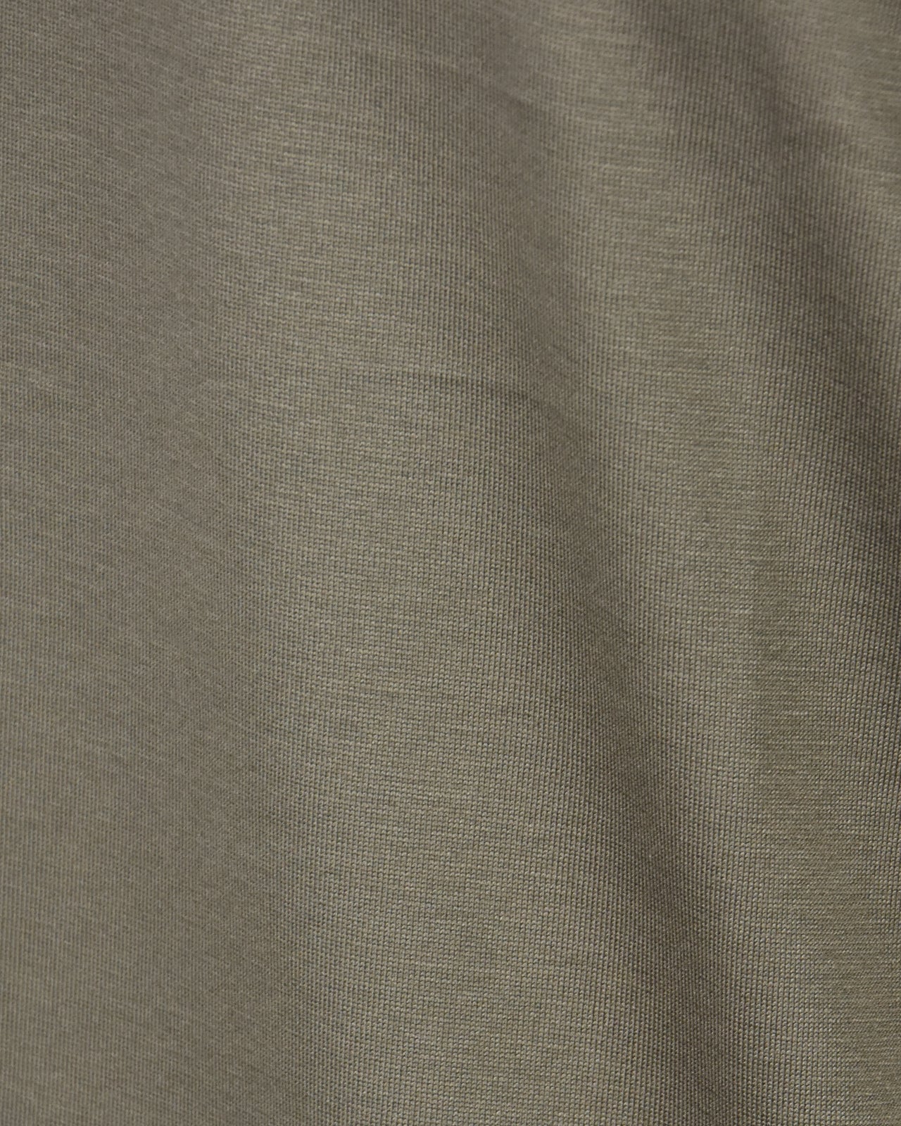 Taupe-brown mercerised T-shirt fabric knit texture close-up