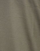 Taupe-brown mercerised T-shirt fabric knit texture close-up