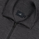 Merino half-zip pullover knit, centered zipper and WAHTS label detail