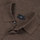 Taupe melange merino polo close-up with button placket and WAHTS neck label