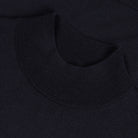 Merino mockneck knit close-up in dark navy