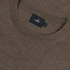 Taupe melange merino knit crewneck with brand tag inside collar