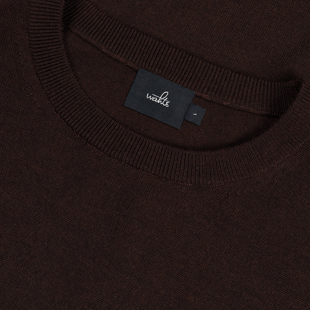 WAHTS label merino crewneck pullover with ribbed collar and cuffs