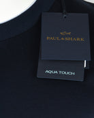 Navy T-shirt with Paul & Shark and AQUA TOUCH hang tags at neckline